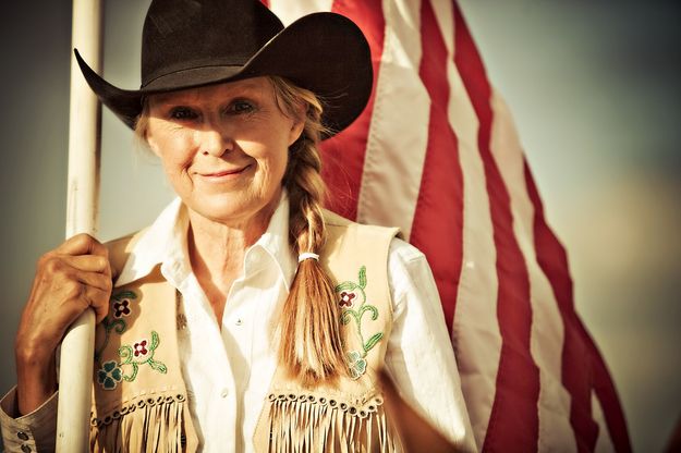 Rodeo smile. Photo by Tara Bolgiano, Blushing Crow Photography.