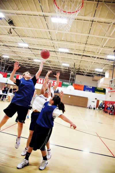 Jump for a basket. Photo by Tara Bolgiano, Blushing Crow Photography.