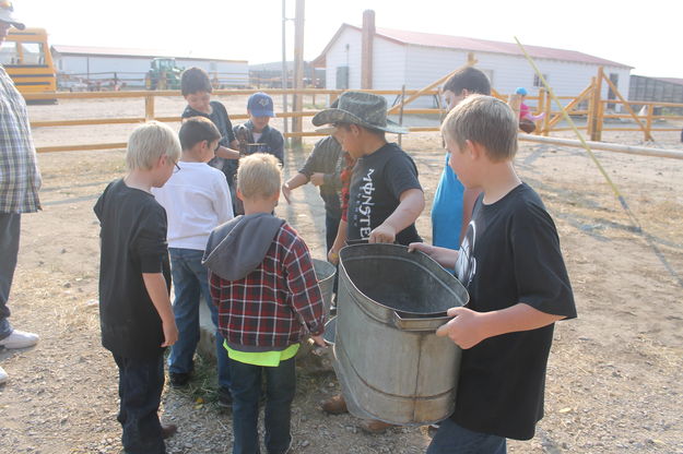 Pumping water. Photo by Dawn Ballou, Pinedale Online.