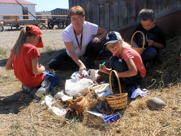 Making clothespin dolls. Photo by Clint Gilchrist, Pinedale Online.