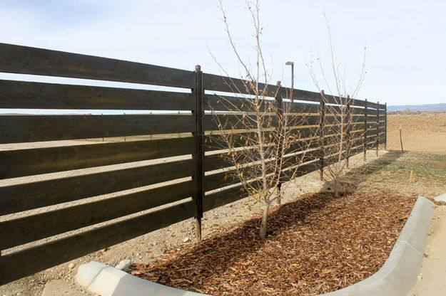 Landscaping and fencing. Photo by Dawn Ballou, Pinedale Online.