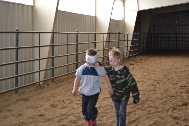 Blind-folded. Photo by M.E.S.A. Therapeutic Horsemanship.