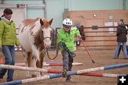 Over the crossrails. Photo by M.E.S.A. Therapeutic Horsemanship.