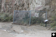 Fenced historical marker. Photo by Dawn Ballou, Pinedale Online.