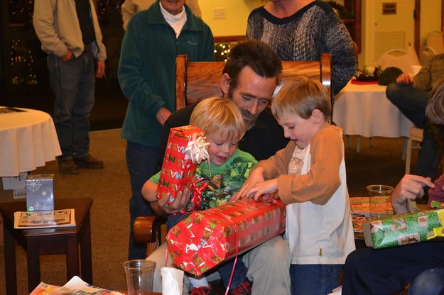 Opening gifts. Photo by Carla Sullivan.