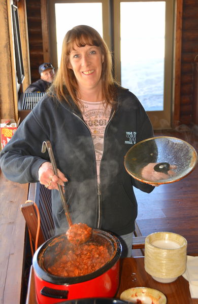 Kim serving chili. Photo by Terry Allen.
