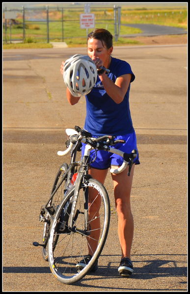 Out of Pool onto Bike. Photo by Terry Allen.