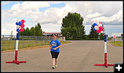 Crossing the Finish Line. Photo by Terry Allen.