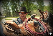 Cowboy, Horse, Saddle. Photo by Terry Allen.