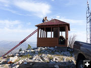 Finishing touches. Photo by Dawn Ballou, Pinedale Online.