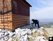 Restacking rocks. Photo by Clint Gilchrist, Pinedale Online.