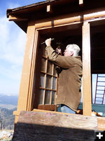 Removing the door. Photo by Dawn Ballou, Pinedale Online.