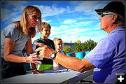 Signing Up. Photo by Terry Allen.