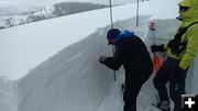 Measuring snow. Photo by Tip Top Search and Rescue.