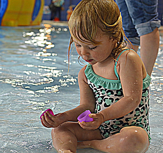 Isla Opens an Egg. Photo by Terry Allen.