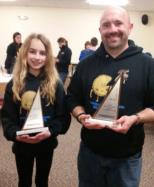 With trophys. Photo by Dahlia Griffin.