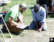 Measuring. Photo by Dawn Ballou, Pinedale Online.