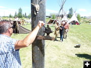 Spinning an elk rawhide tow rope. Photo by Dawn Ballou, Pinedale Online.