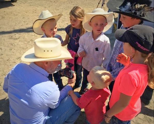 Photographer and the kids. Photo by Kyndall Tibbits.