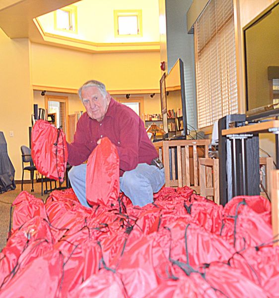 Rollie and the Gift Bags. Photo by Terry Allen.