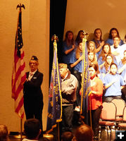 Saluting the flag. Photo by Dawn Ballou, Pinedale Online.