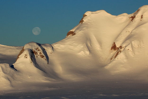 Badlands full moon. Photo by Fred Pflughoft.