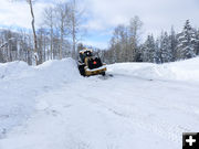 Plowing the parking area. Photo by Wink.