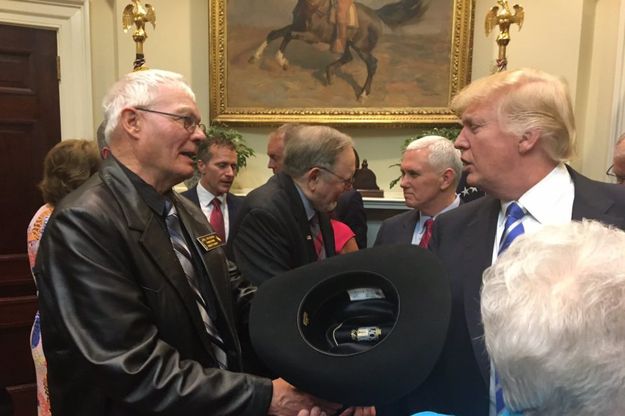 The President gets a cowboy hat. Photo by Wyoming Senator John Barrasso.