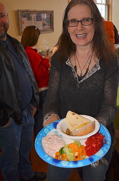 Chris Displays Her Food Art. Photo by Terry Allen.