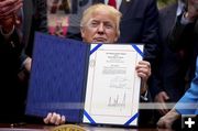 Signed bill. Photo by White House.