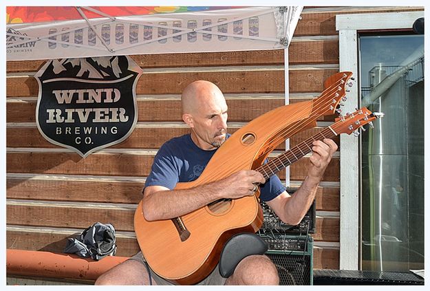 Todd and his Harp Guitar. Photo by Terry Allen.