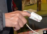 Checking Oxygen Saturation. Photo by Terry Allen.