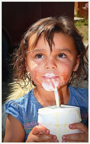 Cora Enjoying Her Milkshake. Photo by Terry Allen.