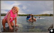 Swimming is Always Good for Kids and Dogs. Photo by Terry Allen.