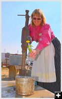 Dawn Watering Flowers. Photo by Terry Allen.