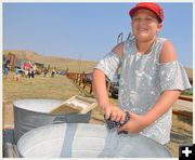 Adri Washes Clothes. Photo by Terry Allen.