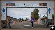 1st Place Woman 10K. Photo by Terry Allen.