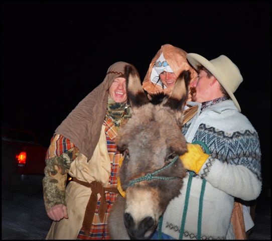 Getting the Donkey to Cooperate. Photo by Terry Allen.