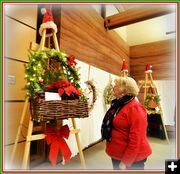 Admiring a Wreath. Photo by Terry Allen.