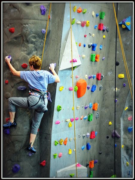 Carolyn Climbs the Wall. Photo by Terry Allen.