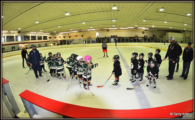 Sportmanship Fist Bumps. Photo by Terry Allen.