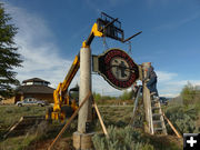 Replacing the sign. Photo by Sublette County Historical Society.