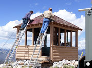 Working on the roof. Photo by Dawn Ballou, Pinedale Online.