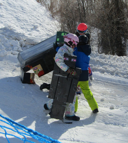 Picking up the pieces. Photo by Dawn Ballou, Pinedale Online.