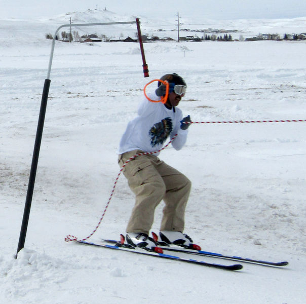 Grabbing the rings. Photo by Dawn Ballou, Pinedale Online.