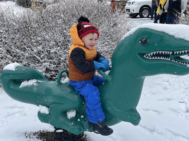 Green dino ride. Photo by Mindi Crabb.