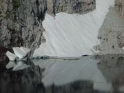 Snowfield Reflection in Dennis Lake. Photo by Dave Bell.
