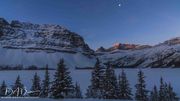Setting Moon and Rising Light At Bow Lake. Photo by Dave Bell.