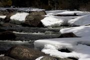 Snowbanks In Boulder Creek. Photo by Dave Bell.