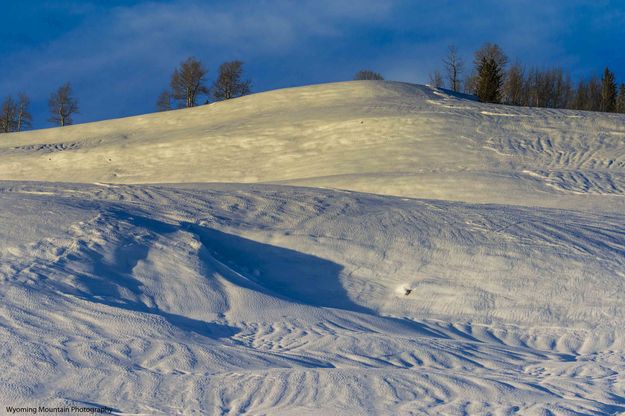 Deep Snow Patterns In Bondurant. Photo by Dave Bell.